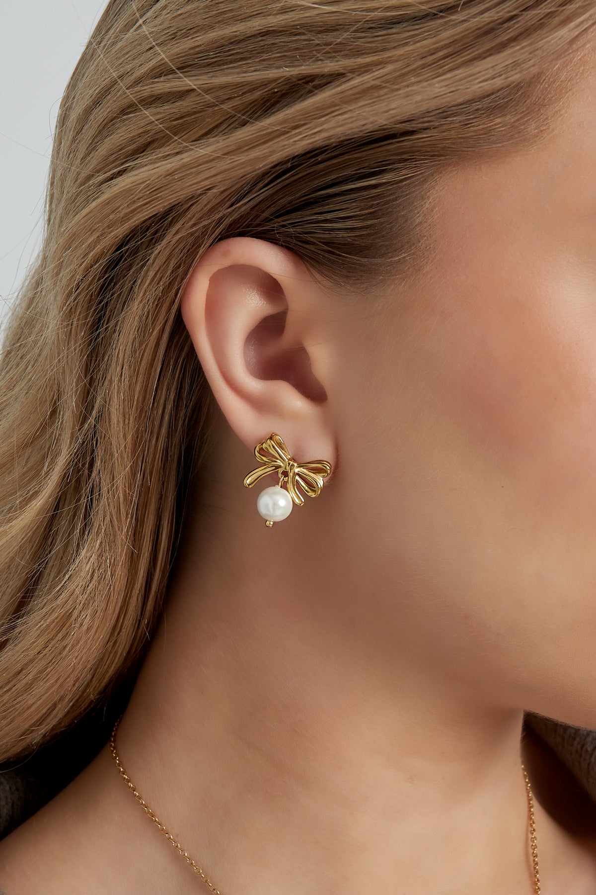 bow earrings with pearl